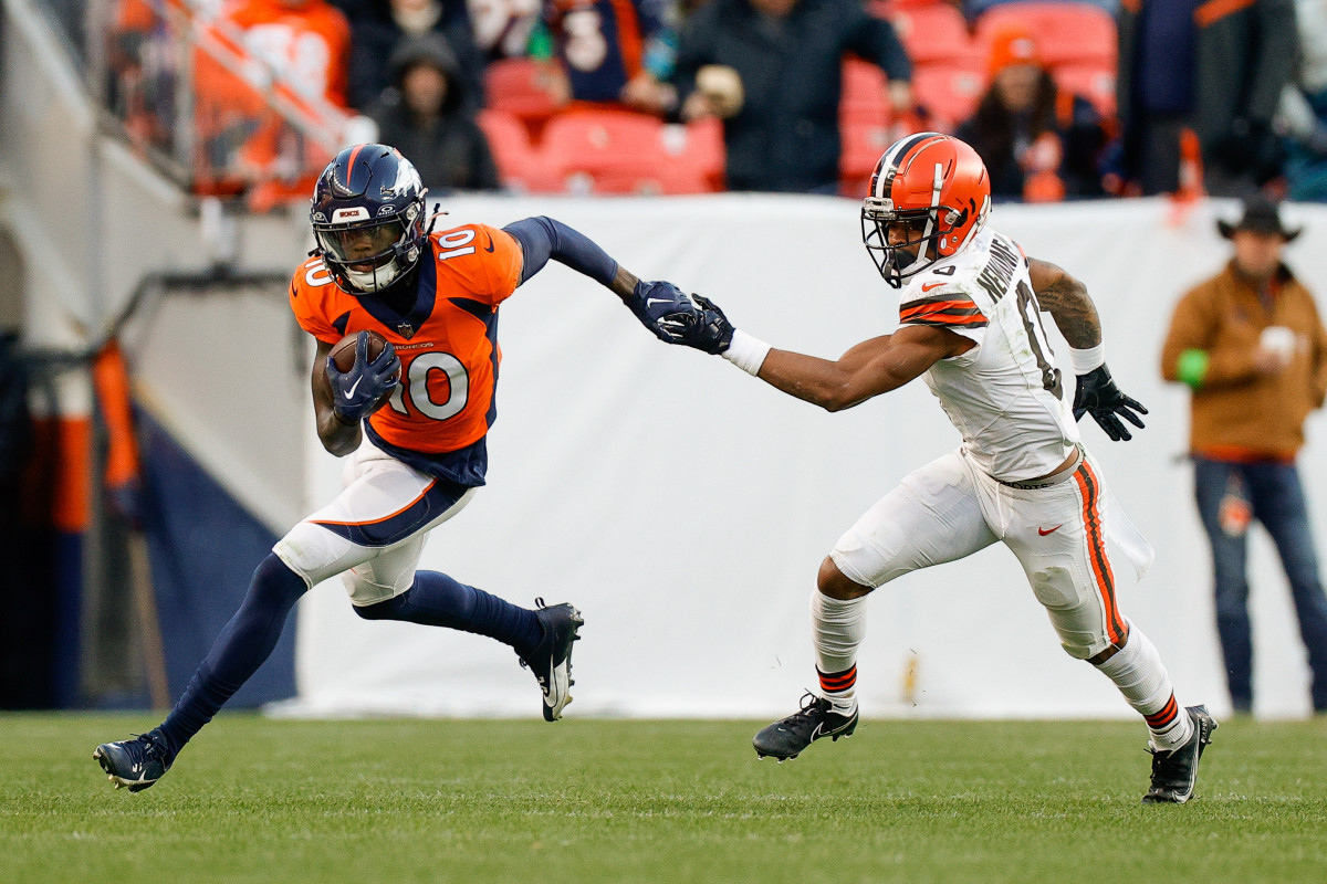 Nov 26, 2023; Denver, Colorado, USA; Denver Broncos wide receiver Jerry Jeudy (10) runs the ball against Cleveland Browns cornerback Greg Newsome II (0) in the third quarter at Empower Field at Mile High. Mandatory Credit: Isaiah J. Downing-USA TODAY Sports  